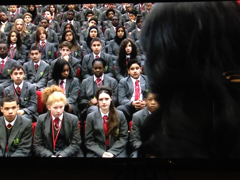 Pupils listening during a school assembly about forced marriage